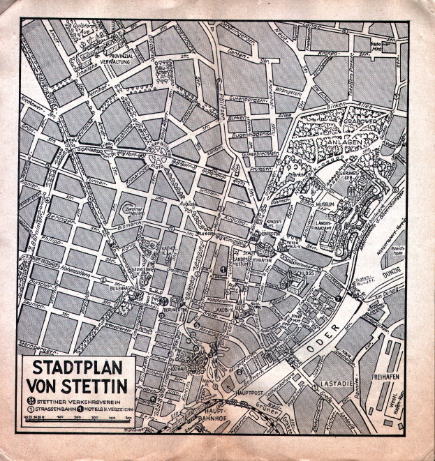 Ein detailliertes altes Stadtplan von Stuttgart auf Papier, der Straßen, Gebäude und Sehenswürdigkeiten zeigt, mit zusätzlichem Text zur Information.