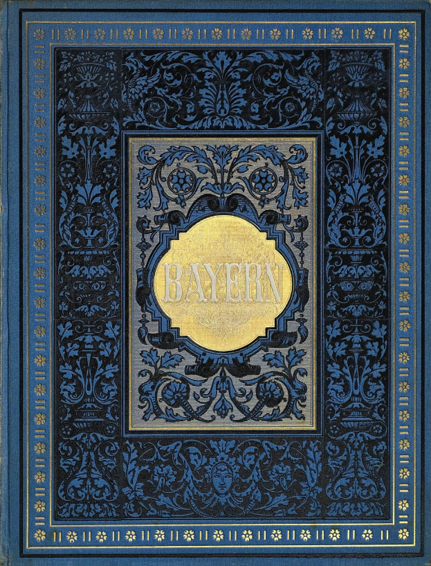 Ein blau-goldenes Buch mit dem Wort "Bayern" auf dem Cover, das mit detaillierten Dekorationsdesigns versehen ist.