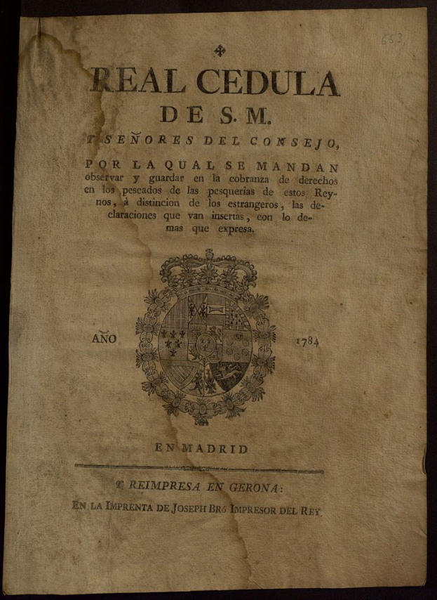 Ein altes Buch mit einem schwarzen Hintergrund und einem Logo, das den Text 'Real Cedula de S.M. en Madrid' zeigt.